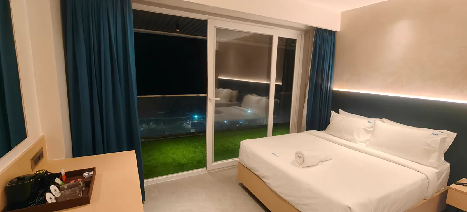 Balcony suite night view at Hotel Ocean Blue